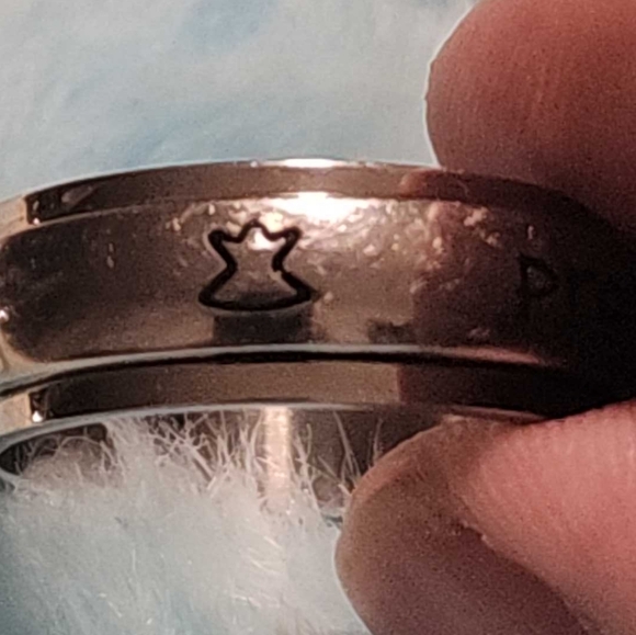 Ring, silver tone, reads "protected by an angel" in black, size 9 - Picture 5 of 7